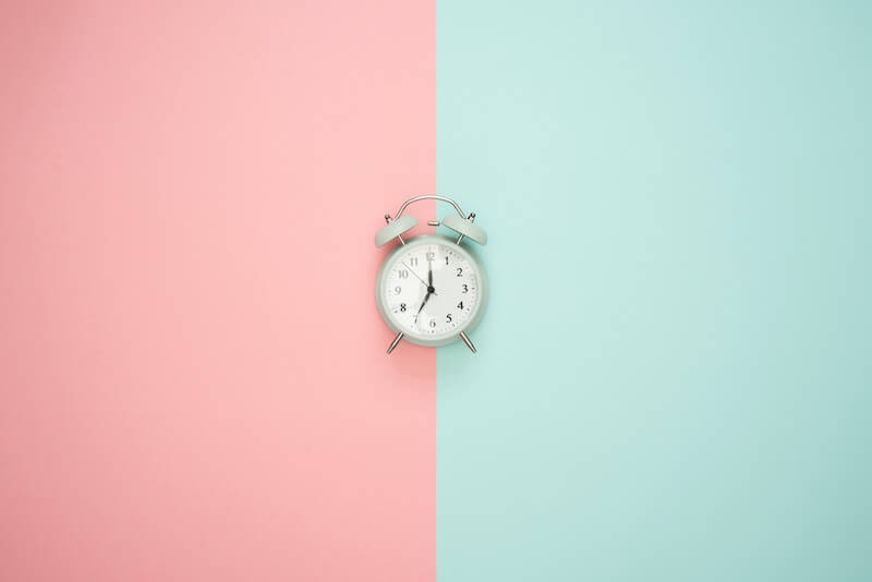 Clock Icon Image. Why Time and Attendance Matters During Economic Uncertainty